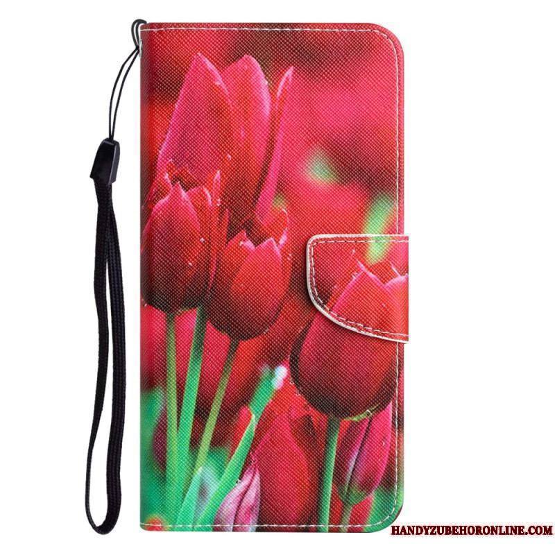 Housse iPhone 15 Déclinaison Florale à Lanière