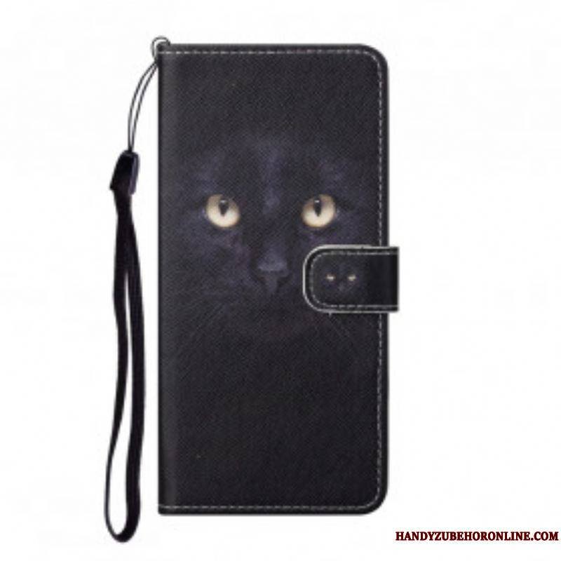 Housse Xiaomi Redmi Note 10 Pro Yeux de Chat Noir à Lanière